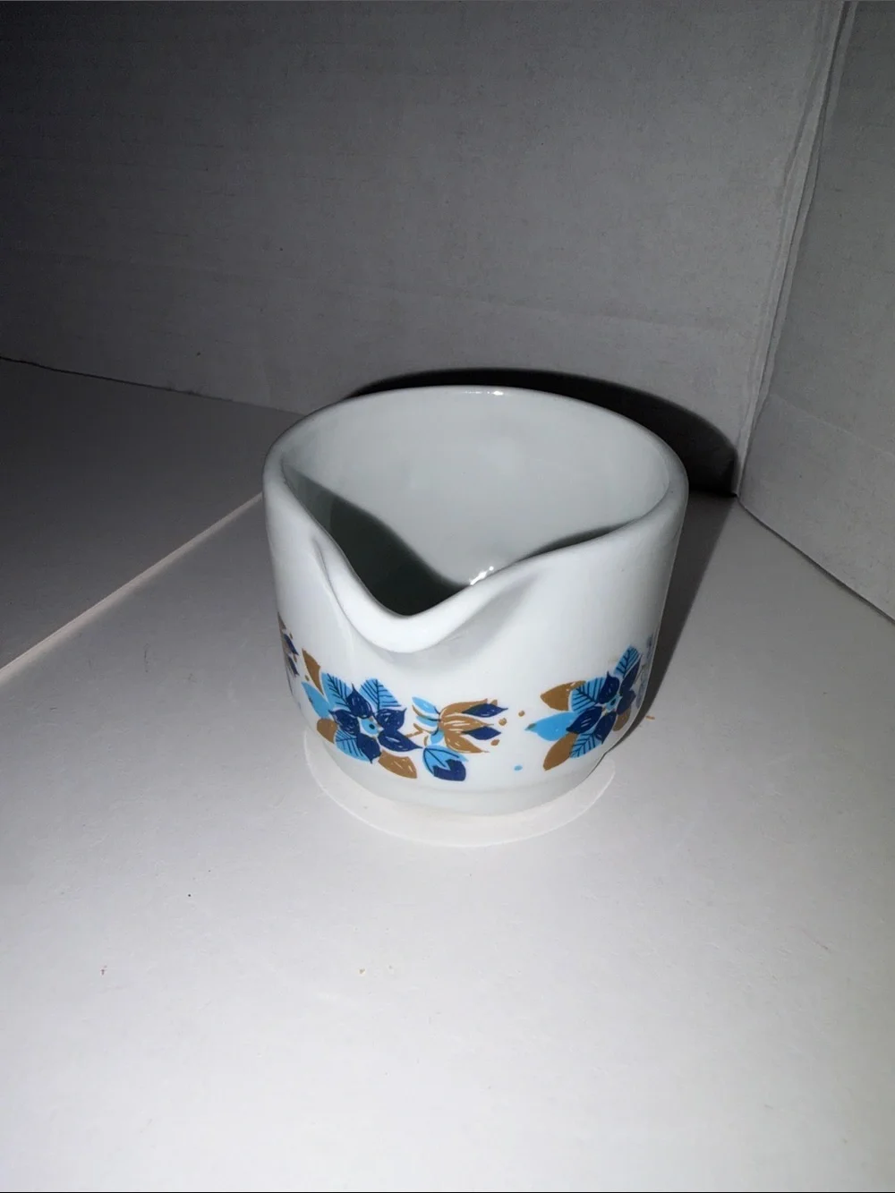 Vitro White Ceramic Creamer with Blue and Gold Floral Pattern